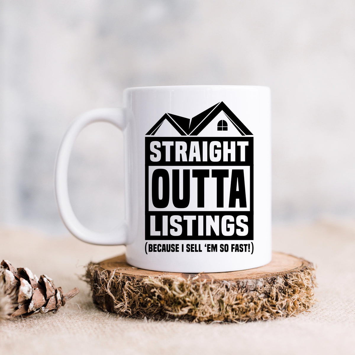 A white mug with a humorous text and graphic design printed on it.