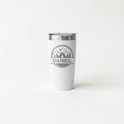 A white insulated tumbler with a lid and a logo that says "DANIEL".