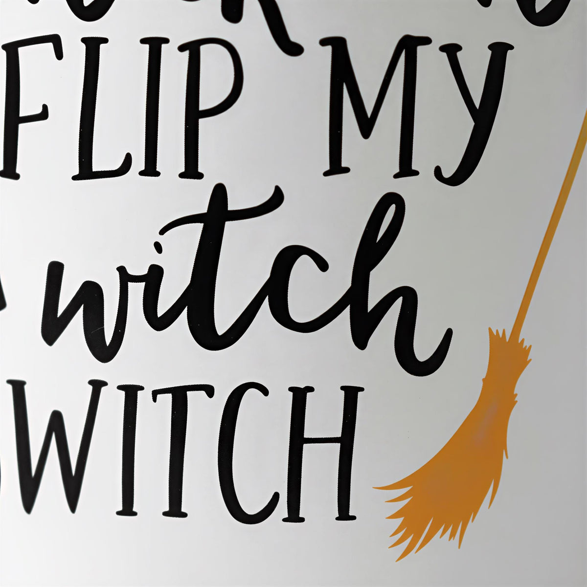 the text "FLIP MY WITCH SWITCH" in a stylized font, with a broom depicted in the bottom right corner.
