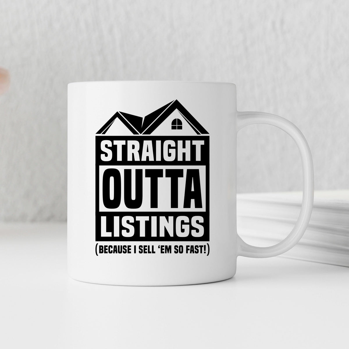 A white mug with a humorous text and graphic design printed on it.