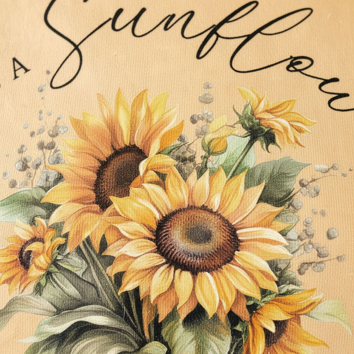 A close-up of a vibrant bouquet of sunflowers, with the text "A Sunflower" written above them.