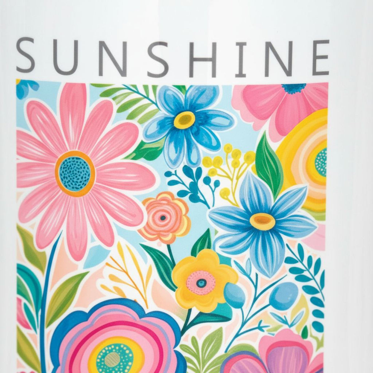 a vibrant and colorful floral pattern with various types of flowers and leaves, including pink, blue, yellow, and green flowers. The text "SUNSHINE" is prominently displayed above the floral design.