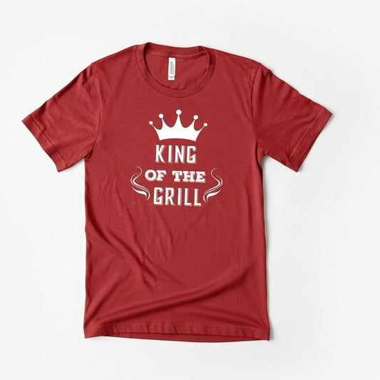 A red t-shirt with the text "KING OF THE GRILL" printed on it.