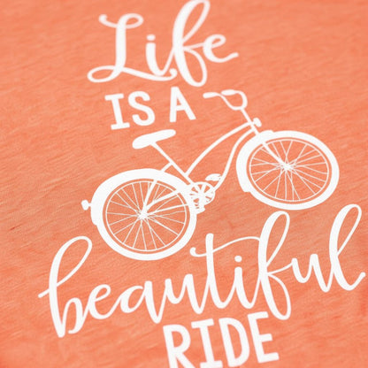 a bicycle and the text "Life is a beautiful ride" in white lettering against an orange background.