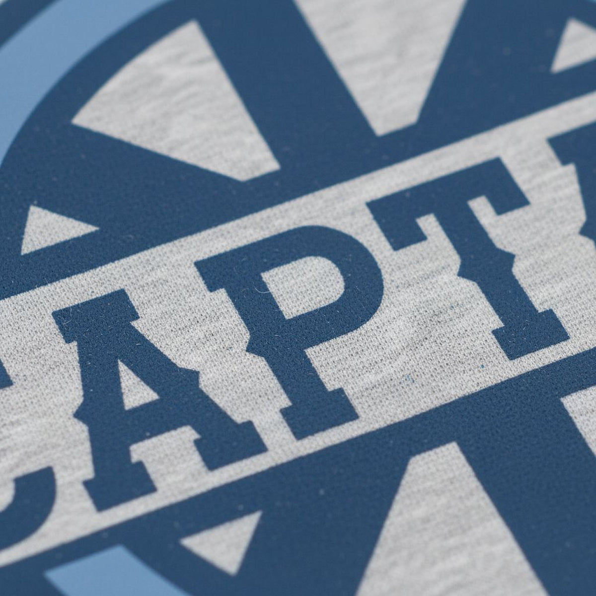 A close-up image of a blue and white logo with the word "CAPT" prominently displayed.
