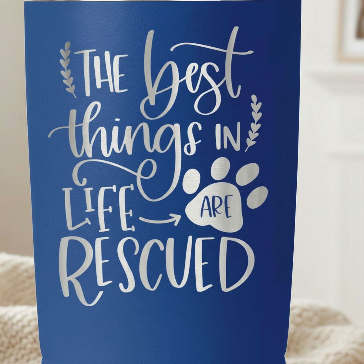 a blue card with white text that reads "The best things in life are rescued".