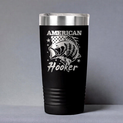 A black tumbler with a silver lid, featuring a white and black design of a fish and the text "American Hooker" printed on it.