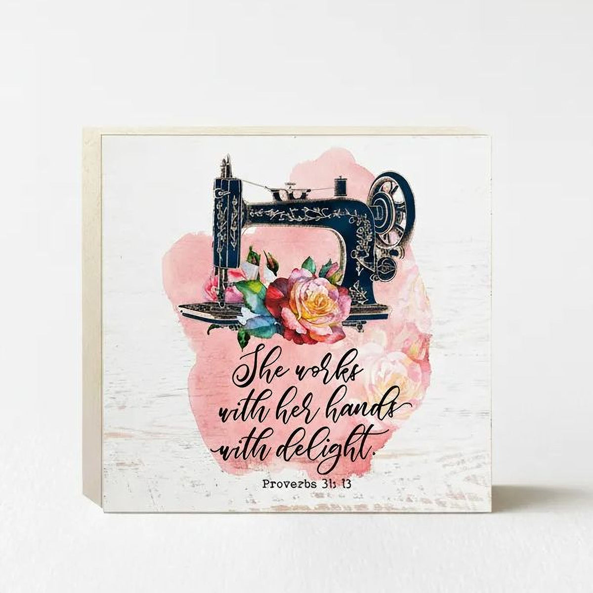 a sewing machine with a floral design, accompanied by a Bible verse from Proverbs 3:13.