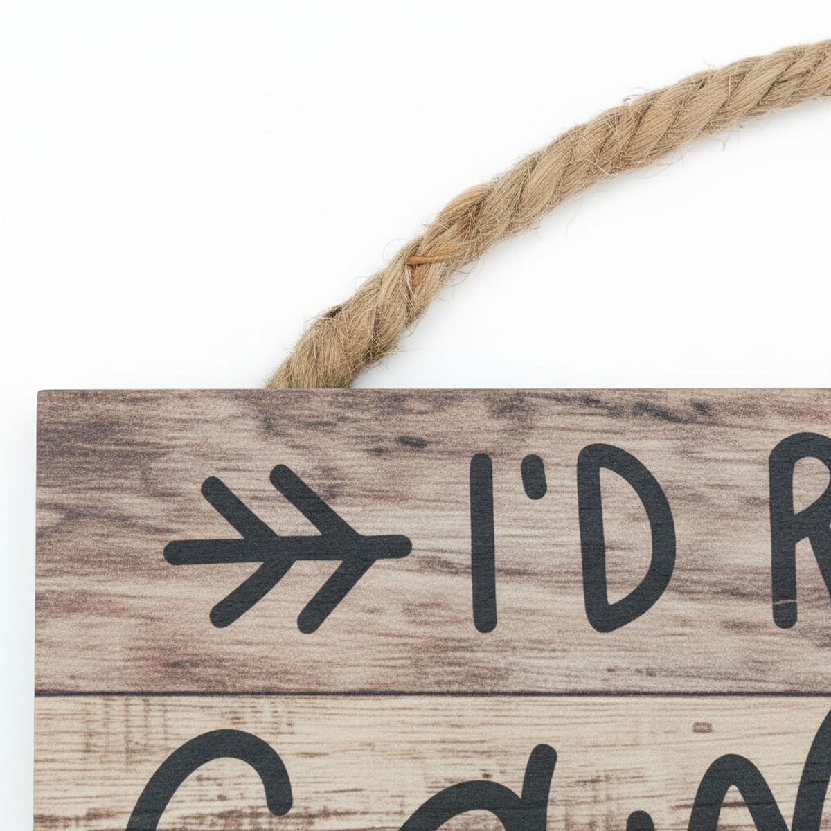 a wooden sign with a rope hanging from it.
