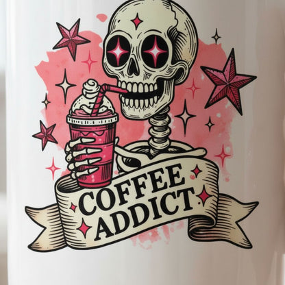 A skull wearing a skeleton costume is holding a pink drink and standing in front of a banner that says "COFFEE ADDICT".