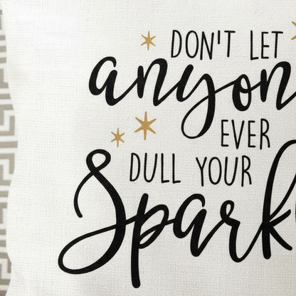 a quote in black text that says "DON'T LET ANYONE EVER DULL YOUR SPARK".