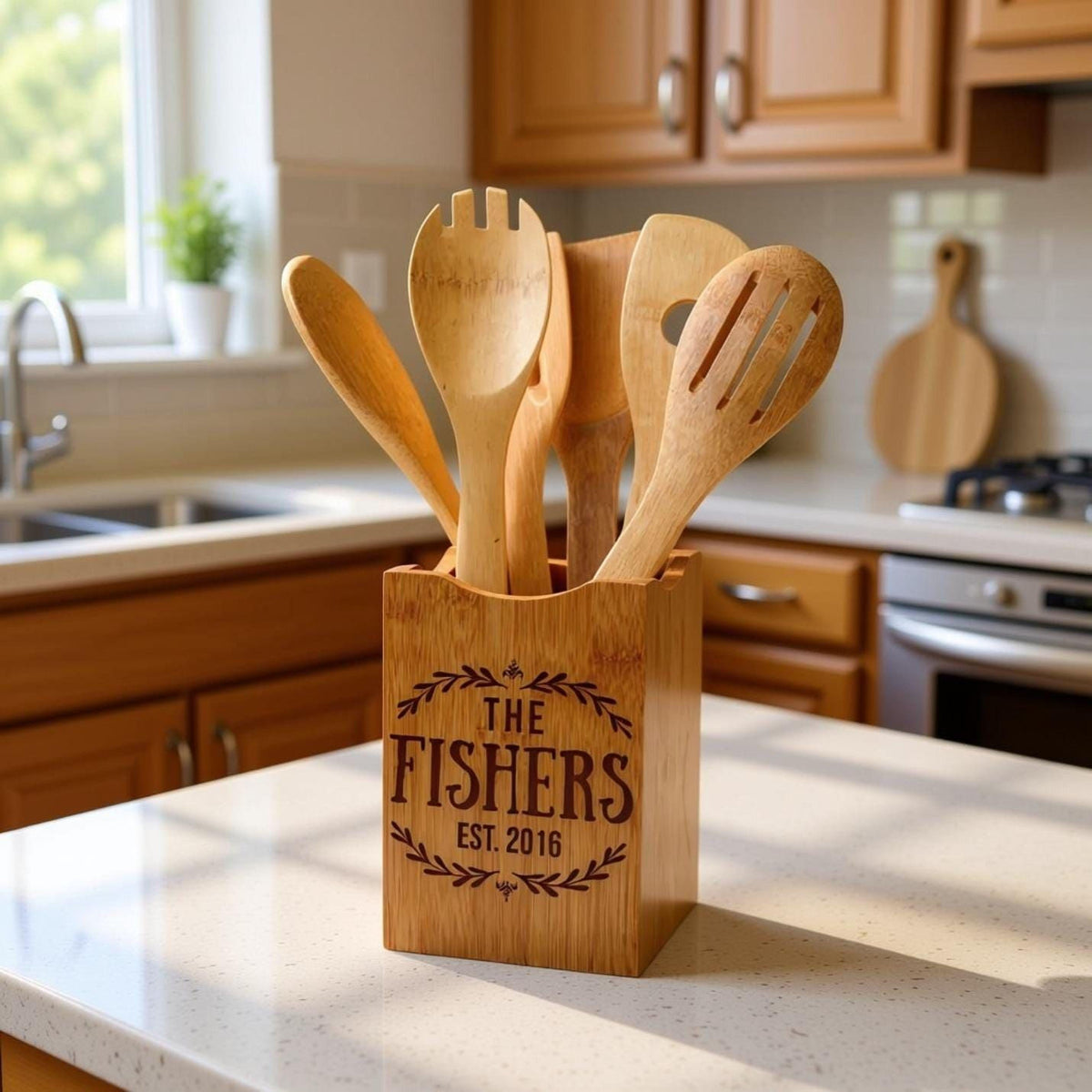A wooden utensil holder with a personalized inscription, featuring a group of wooden spoons and a wooden spatula, placed on a kitchen counter.