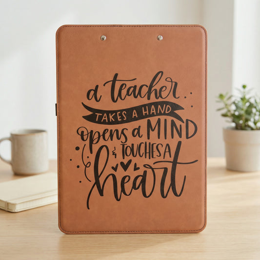 A brown clipboard with a motivational quote about a teacher.