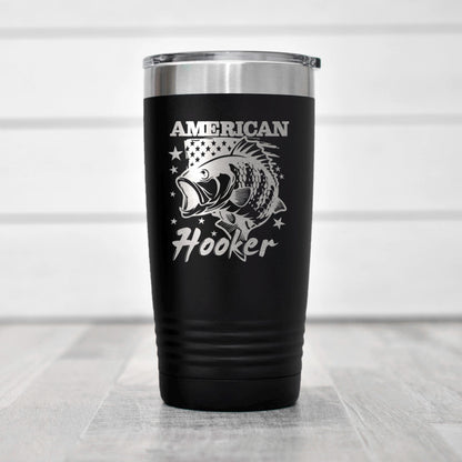 A black insulated tumbler with a silver lid, featuring a silver fish design and the text "AMERICAN Hooker" printed on it.