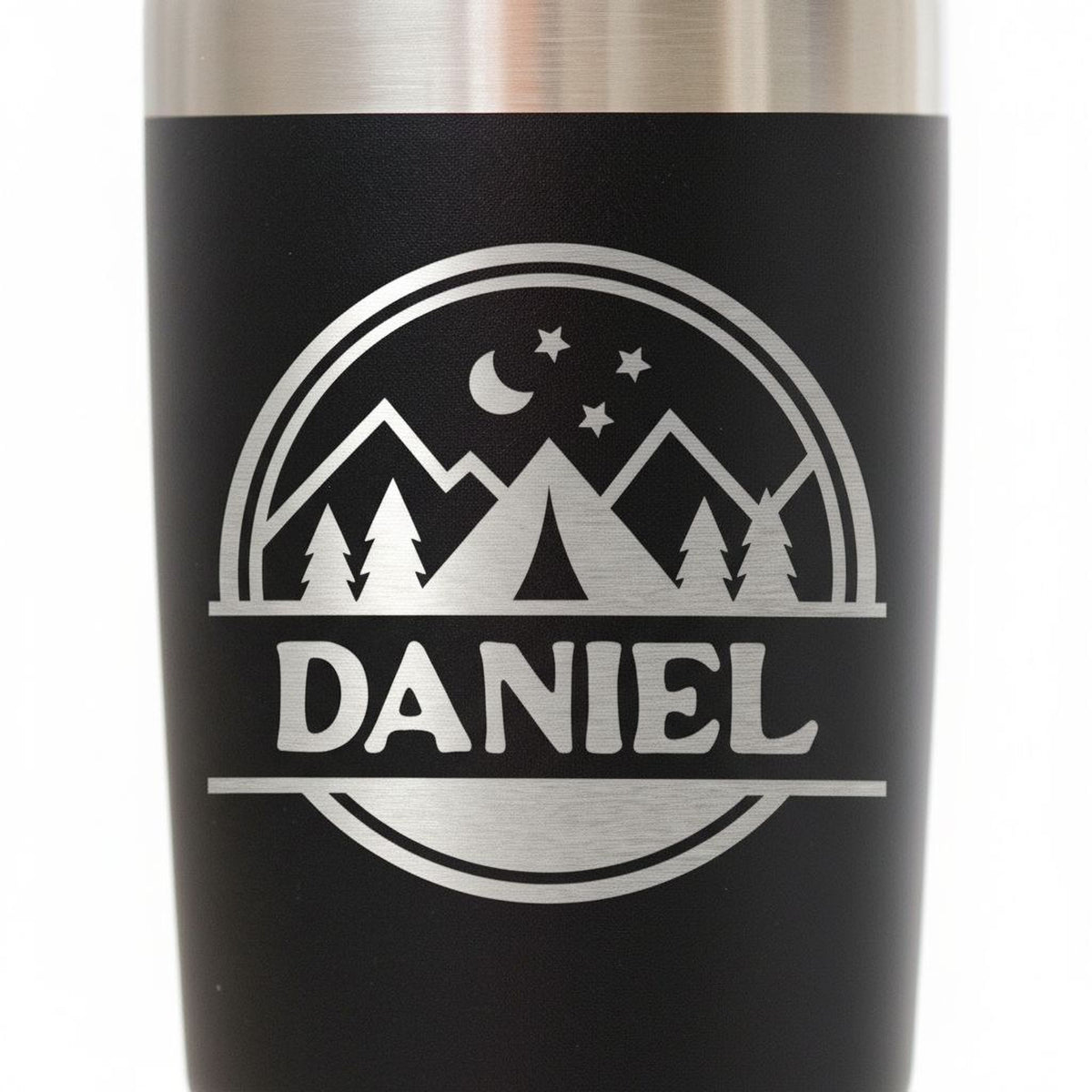A black and silver tumbler with a personalized name and mountain landscape design printed on it.