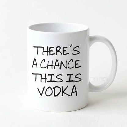 A white ceramic mug with black text printed on it.