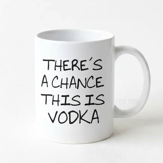 A white ceramic mug with black text printed on it.